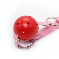 Красный силиконовый кляп-шар на розовом ремешке