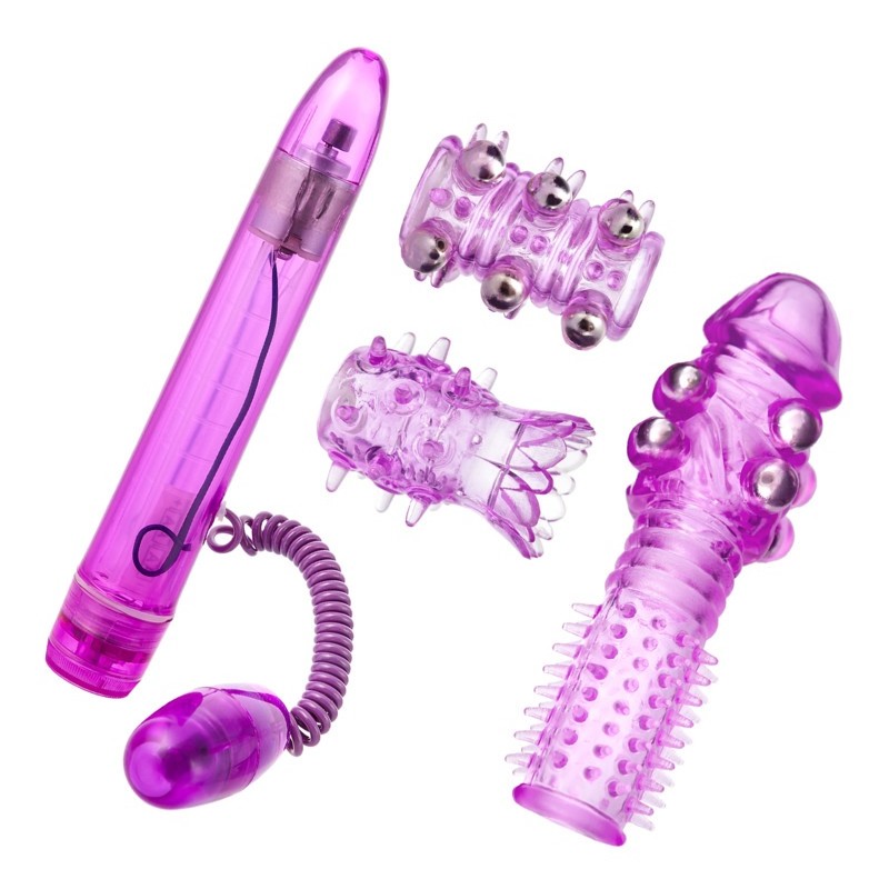 Фиолетовый вибратор с набором насадок