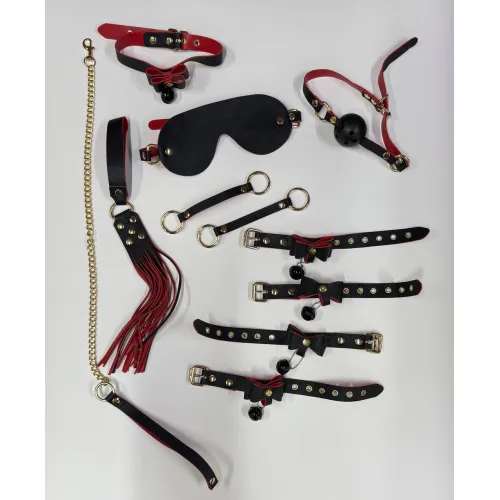 Фото Адам и Ева БДСМ набор Колокольчик черно-красного цвета (наручники, кляп, паножи, ошейник, поводок, флогер, маска, два карабина)
