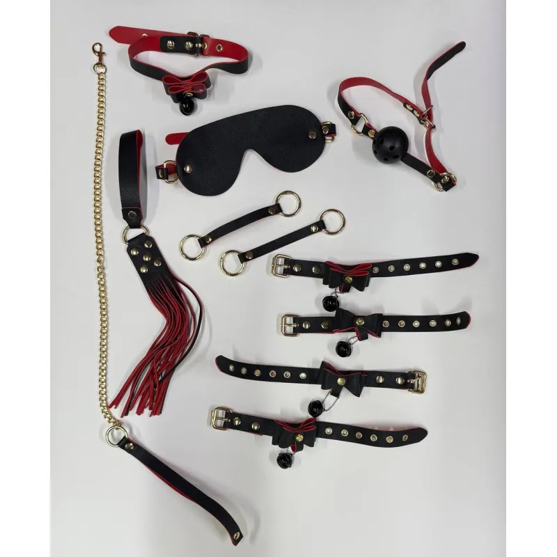 Фото Адам и Ева БДСМ набор Колокольчик черно-красного цвета (наручники, кляп, паножи, ошейник, поводок, флогер, маска, два карабина)