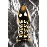 Изображение Metal by TOYFA Анальная втулка Metal by TOYFA, металл, золотая, с красным кристаллом, 10,5 см, Ø 4 см, 165 г