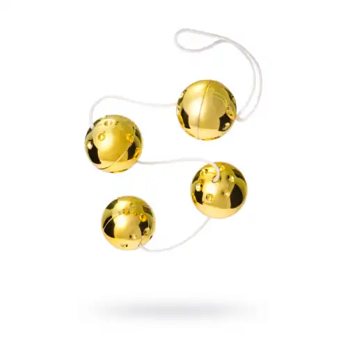 Фото Seven Creations Вагинальные шарики Dream Toys со смещенным центром тяжести, ABS пластик, золотые, 4 шт., Ø3,5 см