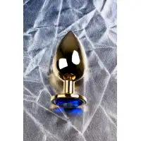 Изображение Metal by TOYFA Анальная втулка Metal by TOYFA, металл, золотая, с синим кристаллом, 9,5 см, Ø 4 см, 145 г