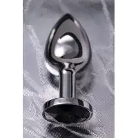 Фото Metal by TOYFA Анальная втулка Metal by TOYFA, металл, серебряная, с черным кристаллом, 7,5 см, Ø 3 см, 145 г