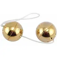 Фото PipeDream, США Два золотых вагинальных шарика Gold Balls Set