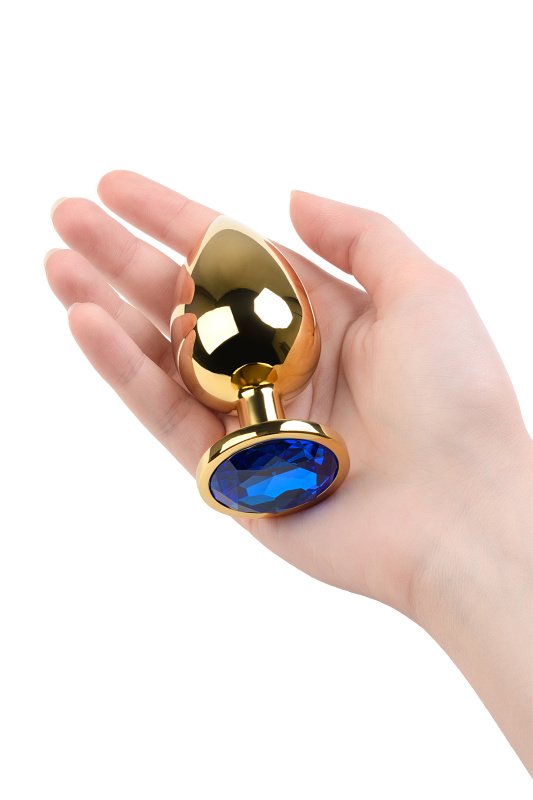 Изображение Metal by TOYFA Анальная втулка Metal by TOYFA, металл, золотая, с синим кристаллом, 9,5 см, Ø 4 см, 145 г
